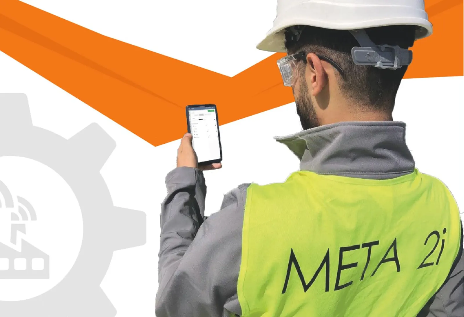 Technicien Meta 2i en intervention, smartphone en main